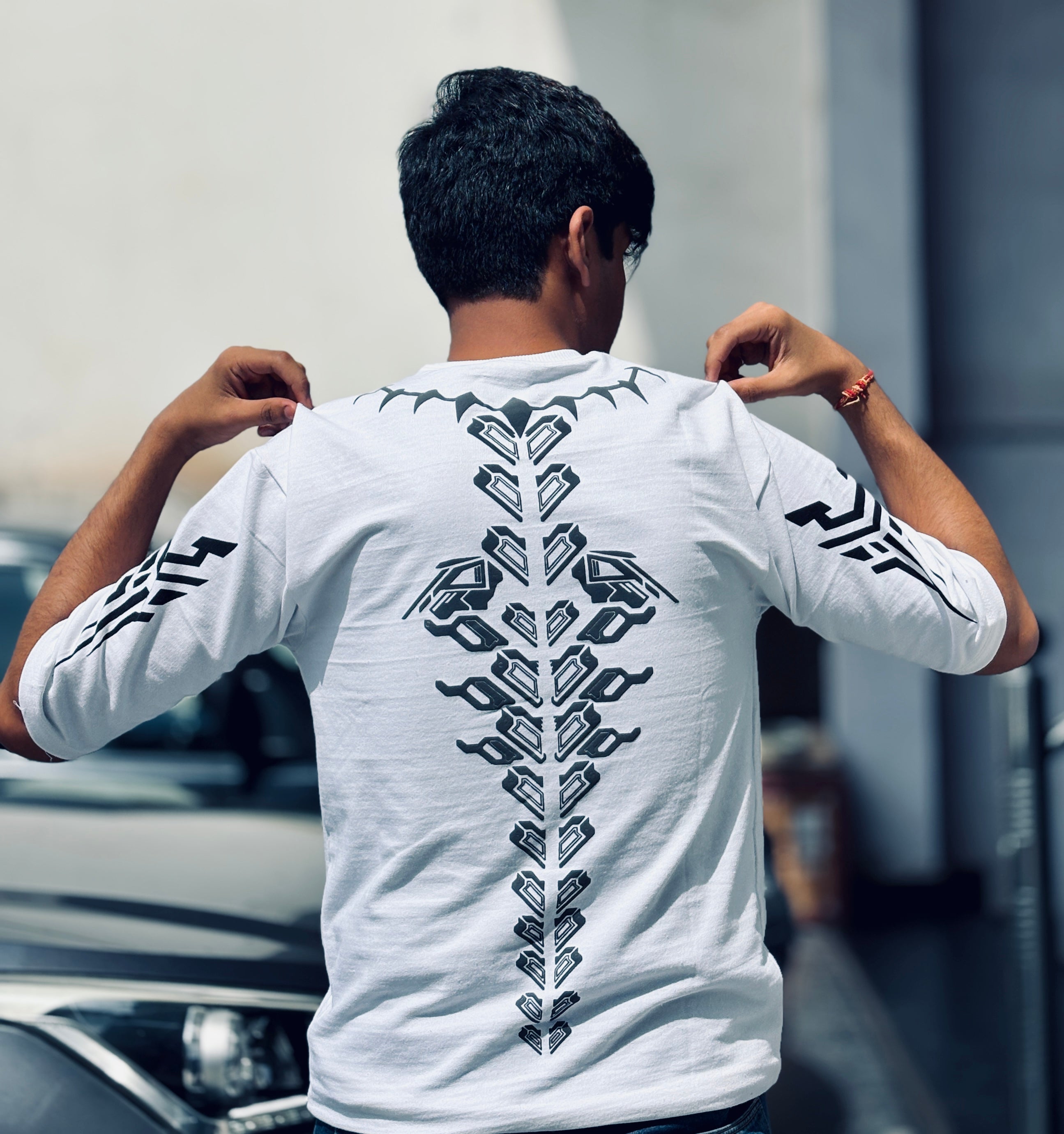 Tribal Spine Graphic White Oversized T-Shirt | Streetwear Edition